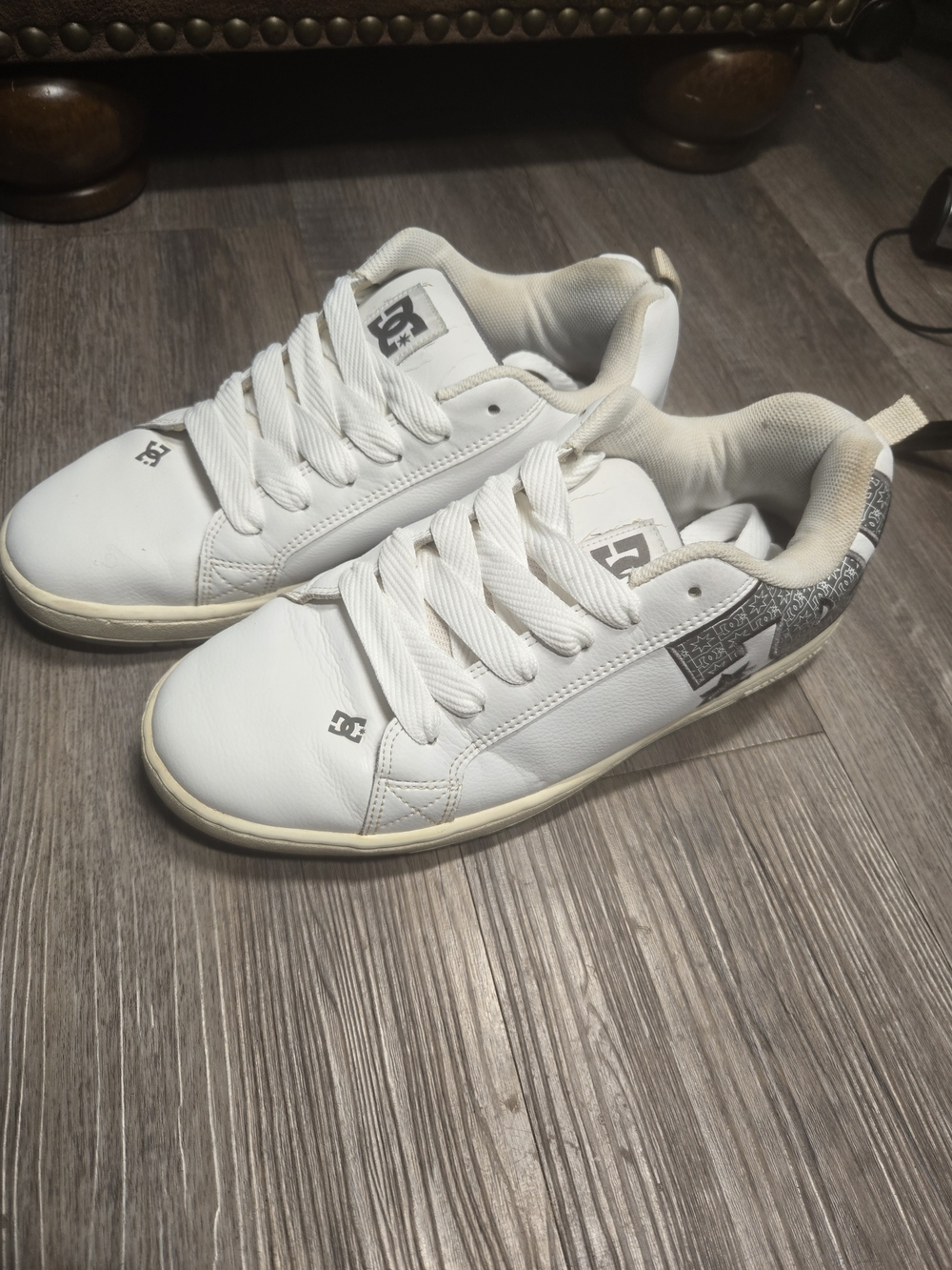 DC White Kids Low-Top Skate Sneakers with Black Logo Accents